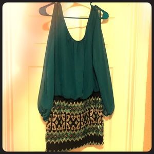 Turquoise dress with sequin bottom.